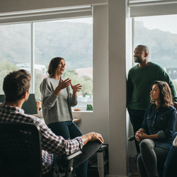 four people talking