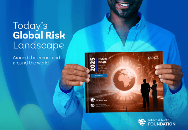 Risk in Focus tile with a person holding the global report cover