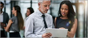 man-and-woman-looking-at-tablet.jpg