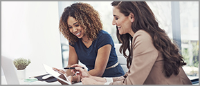 two-women-looking-at-tablet.jpg